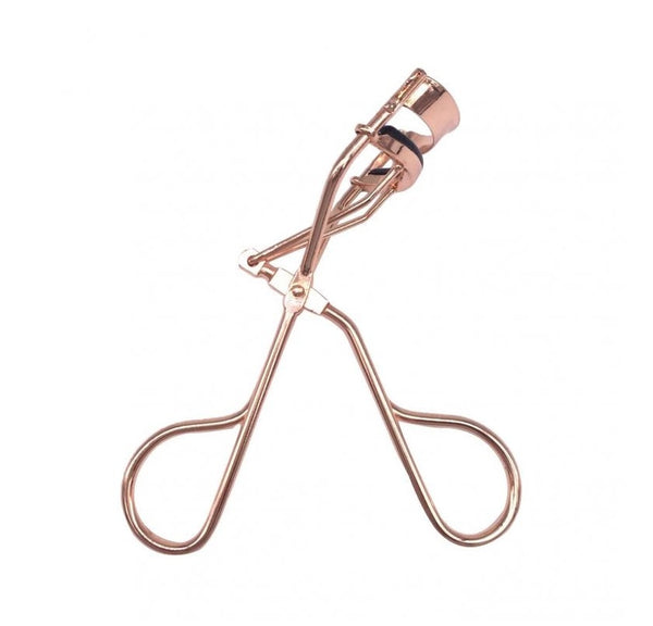 Eyelash Curler: A handheld tool with curved clamps used to curl eyelashes for a more lifted and voluminous look.