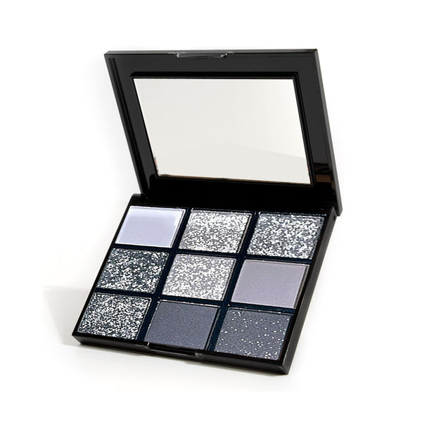 A vibrant palette of 9 glitter eyeshadows in various colors for a dazzling eye makeup look.